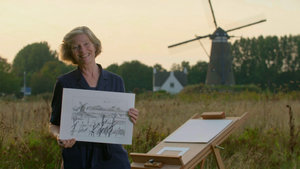 The workshop teacher shows the end result of her drawing: a landscape with a wind mill