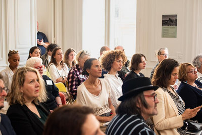 People listening to a lecture during the Van Gogh Europe Seminar