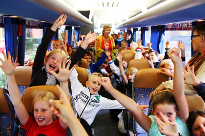 Kinderen in de Museumpleinbus. Foto: Tomek Dersu Aaron